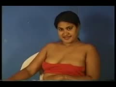 A dark-haired Indian overweight dilettante flaunts her breasts on camera.